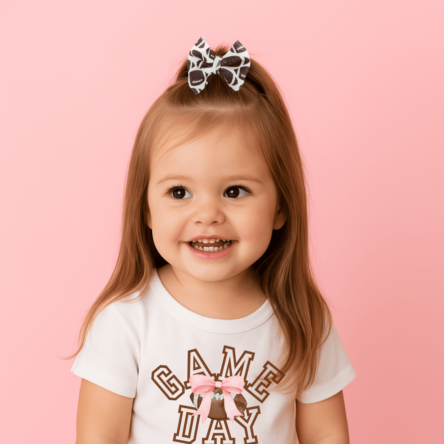 Football Bow | Clip in Hairbow | Handmade | Small Bow | Brown Footballs